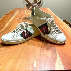 Gucci leather Ace sneakers with crystal, sequin and python detail.